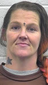 Woman charged with endangering minor in connection to Covington quadruple  shooting