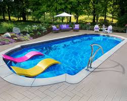Considering An Inground Fiberglass Swimming Pool We Ve Put Together A Pricing Guid Small Inground Pool Swimming Pools Backyard Inground Fiberglass Pool Prices