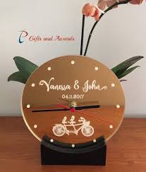 As per their years of togetherness, choose a thoughtful gift like nameplate, frames, couple jewellery. Pt Gifts And Awards Personalised Acrylic Engraved Desk Clock With Stand Gift For The Couple