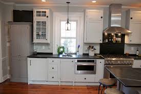 Perfectly settled in the shade of three majestic oak trees, this timeless homestead evokes a deep sense of belonging to the land. New And Old Mix It Up In A Historic Farmhouse Kitchen