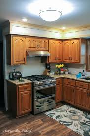 We have a light blue bathroom. Diy Kitchen Soffit Makeover How To Disguise A Kitchen Soffit Average But Inspired