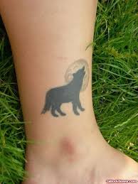 Today the moon in in the galaxy of the wolf. Moon And Howling Wolf Tattoo On Leg