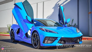 Lamborghini has always been a brand associated with luxury high end living. C8 Corvette With Lambo Doors Does Supercar Impression In Rapid Blue Autoevolution