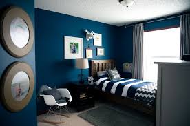 The bedroom wall gets painted in the bold and soft shade of teal while some of the pillows covers share the same teal shade. Pin By Jenni Wood On Bedroom In 2021 Blue Boys Bedroom Teal Blue Bedroom Room