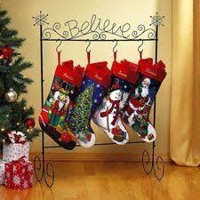 Organize Decorate Eat How To Hang Stockings Without A Mantel Christmas Stockings Christmas Stocking Holders Christmas Decorations