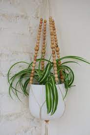 beaded plant hanger wooden planter etsy in 2021 diy macrame hanging troughs for balconies