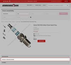 A close-up of a Vehicle Identification Number (VIN)
 plate on a car's door jamb, showing the 17-digit code used to check compatibility of car parts.