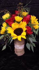 Sunflowers And Red Rose Centerpiece With Burlap And Lace Red Roses And Sunflowers Sunflowers And Roses Sunflower Wedding Bouquet