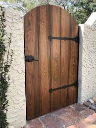 The Interior Of This Gate Showcases A Dark Bronze Gate Latch That Matches The Lever Used On The Exterior With A Si Wooden Fence Gate Wooden Gate Door Wood Gate