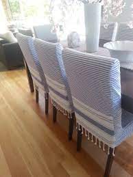 The breezy tranquility of a seaside vacation home can be achieved in any space with coastal décor. Dining Chair Covers Dining Chair Covers Dining Room Chair Covers Slipcovers For Chairs
