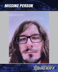 We are currently investigating a missing person: Paul J. Pruden, age 21 of  Henrietta. Paul is approximately 6'1", 145 lbs., wears glasses and has a  long beard and long brown hair. He