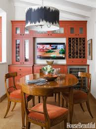 The burnt orange, rust sofa immediately caught my eye with its vertical channeling on the backside panel and two plump cushions for seating. Burnt Orange Kitchen Burnt Orange Decor
