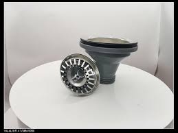 plastic garbage disposal leaking from