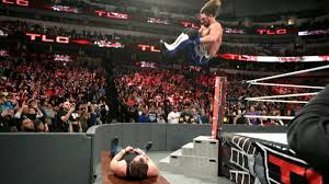 Photos Aj Styles And Dean Ambrose Shock The World In Wild Tlc Match Wwe Live Events Wwe World Aj Styles