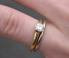 The rings were a symbol of owning the woman. On Which Finger Should You Wear An Engagement And Wedding Ring