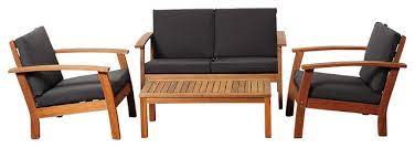 Wood is a favorite material for outdoor furniture. In Stock Amazonia Murano 4 Piece Patio Seating Set With Black Cushions Eucalyptus Wood Transitional Outdoor Lounge Sets By Amazonia Houzz