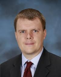 Quantum light squeezes the noise out of microscopy signals