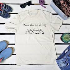 The Mountains Are Calling And I Must Go T Shirt Mountains Are Calling Shirt The Mountains Are Calling And I Etsy In 2020 Hiking Shirts Shirts Shirts With Sayings