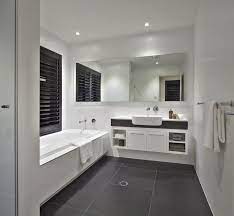Tile trends for bathroom and powder room flooring. White Vanity Grey Tile Bathroom Gray And White Bathroom Grey Bathroom Tiles Grey Bathroom Floor