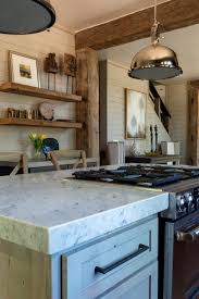 cabin kitchen features rustic wood trim