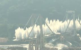 La 19 luni de la prabusirea tragica a podului morandi, cunoscut oficial ca viaductul polcevera, de la genova, rina, compania insarcinata sa gestioneze atat demolarea vechiului pod, cat si reconstructia lui, a anuntat ca se finalizeaza constructia principala pe masura ce ultima portiune este ridicata. Podul Morandi Din Genova PrÄƒbusit ParÅ£ial In 2018 A Fost Demolat Imagini De La Explozia ControlatÄƒ Video