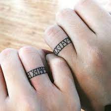 60 Hearwarming Wedding Ring Tattoo Ideas The New In 2021 Wedding Band Tattoo Tattoo Wedding Rings Ring Tattoo Ideas