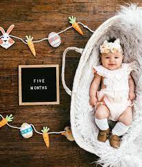 It is caused by a rare disease that turns muscles into bones and prevents the baby from moving his body. 5 Month Milestone Picture Baby Milestones Baby Girl Easter Easter Photoshoot Baby Baby Easter Pictures Easter Baby Photos