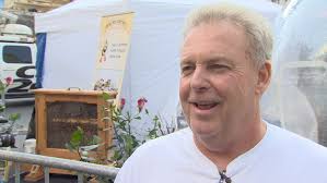 Man sets new Guinness world record for wearing a bee beard in Toronto