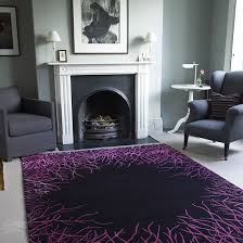 Striking Purple Rug Is A Bright Accent In An Otherwise Muted Living Room Purple Living Room Rugs In Living Room Elegant Furniture