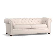 Measures (as a sofa) 78 w x 34.5 d handsome caramel colored leather chesterfield sleeper sofa with nailhead trim and tufted leather throughout. Chesterfield Roll Arm Upholstered Sleeper Sofa Pottery Barn