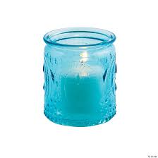 A votive candle or prayer candle is a small candle, typically white or beeswax yellow, intended to be burnt as a votive offering in an act of christian prayer, especially within the anglican, lutheran, and roman catholic christian denominations, among others. Blue Vintage Glass Votive Candle Holders Oriental Trading