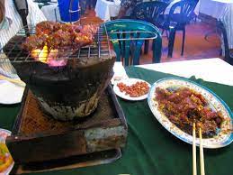 Luong Son Bo Tung Xeo Saigon Vietnam The Best Beef Barbecue Restaurant In Saigon It S In The Open Barbecue Restaurant Cooking On The Grill Beef Barbecue