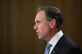 Health minister Greg Hunt goes to hospital with infection but says don't  blame the jab