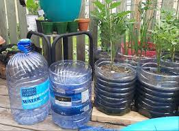 Diy Water Jug Planter And Rain Catcher In 2021 Diy Water Bottle Water Jug Diy Water