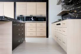 For a wow factor, pair the cabinetry with white calacatta marble countertops, or for more functionality, a white quartzite. Modern Kitchen With White Oak Cabinets Normandy Remodeling