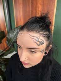 Image result for forehead tattoo