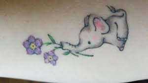 Cute Little Elephant Holding Purple Forget Me Nots For You Nanny Dementia Tattoo Ideas Cover Up Tattoo Ideas Awareness Tattoo