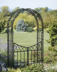 Order a custom color trellis to be the spot for climbing ivy and vines. Essex Garden Arch With Gate Gardeners Com