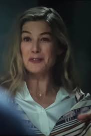 Hello lovely Admins! Looking for the scarf worn by Rosamund Pike as  Veronika Vanderwald in Now You See Me, Now You Don't. Thank you!