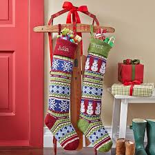 These stocking hangers work perfectly on my mantle. 8 Creative Ways To Hang Stockings Without A Fireplace Mantel