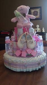 How To Make A Diaper Cake For Your Next Baby Shower Cute Baby Shower Gifts Diy Baby Shower Gifts Baby Shower Baskets