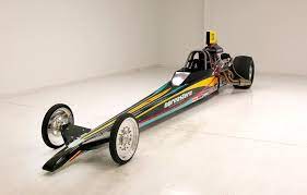 The object of the game is to either beat the player's opponent across the screen, or to race against the clock for best time. 1989 Meng Dragster Classic Auto Mall