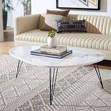 So rest easy, put your feet up. Safavieh Home Collection Wynton Mid Century Modern White And Black Coffee Table Buy Online In Andorra At Andorra Desertcart Com Productid 30112693