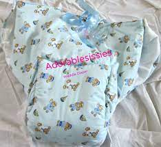 Under her pajamas is a purple diaper, approximately the size of a large pumpkin. Pin On Ab Clothes