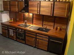 The concrete countertops add an industrial edge to the traditional cabinetry. Kitchen Made Of Welded Steel Frames With Sanded Walnut Boards And A 2 4 Solid Walnut Framed Kitchen Cabinets Kitchen Remodel Design Functional Kitchen Design