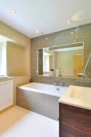 Choosing the perfect bathroom light fixtures is a great way to take keep reading for 10 creative bathroom lighting ideas to help guide you as you style your image source: How To Install Recessed Lighting Above A Shower Overstock Com