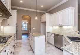 Spacious Kitchen With Custom White Cabinets Light Travertine Backsplash And Rectangular Diy Kitchen Backsplash Trendy Kitchen Backsplash Travertine Backsplash