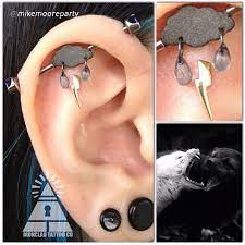This May Be The Coolest Piece Of Jewelry I Ve Seen This Year A Custom Sandblasted Black Gold Industrial Piercing Jewelry Earings Piercings Black Gold Jewelry