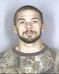 Suspect accused of shooting officer near Silverton tree farm indicted