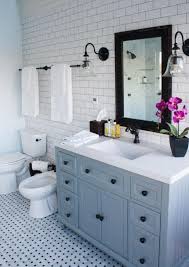 Oh you are going to love today's post on farmhouse bathrooms! A Bathroom With A Sink And A Mirror Description Generated With Very High Confidence Traditional Bathroom Blue Bathroom Accessories White Bathroom Designs